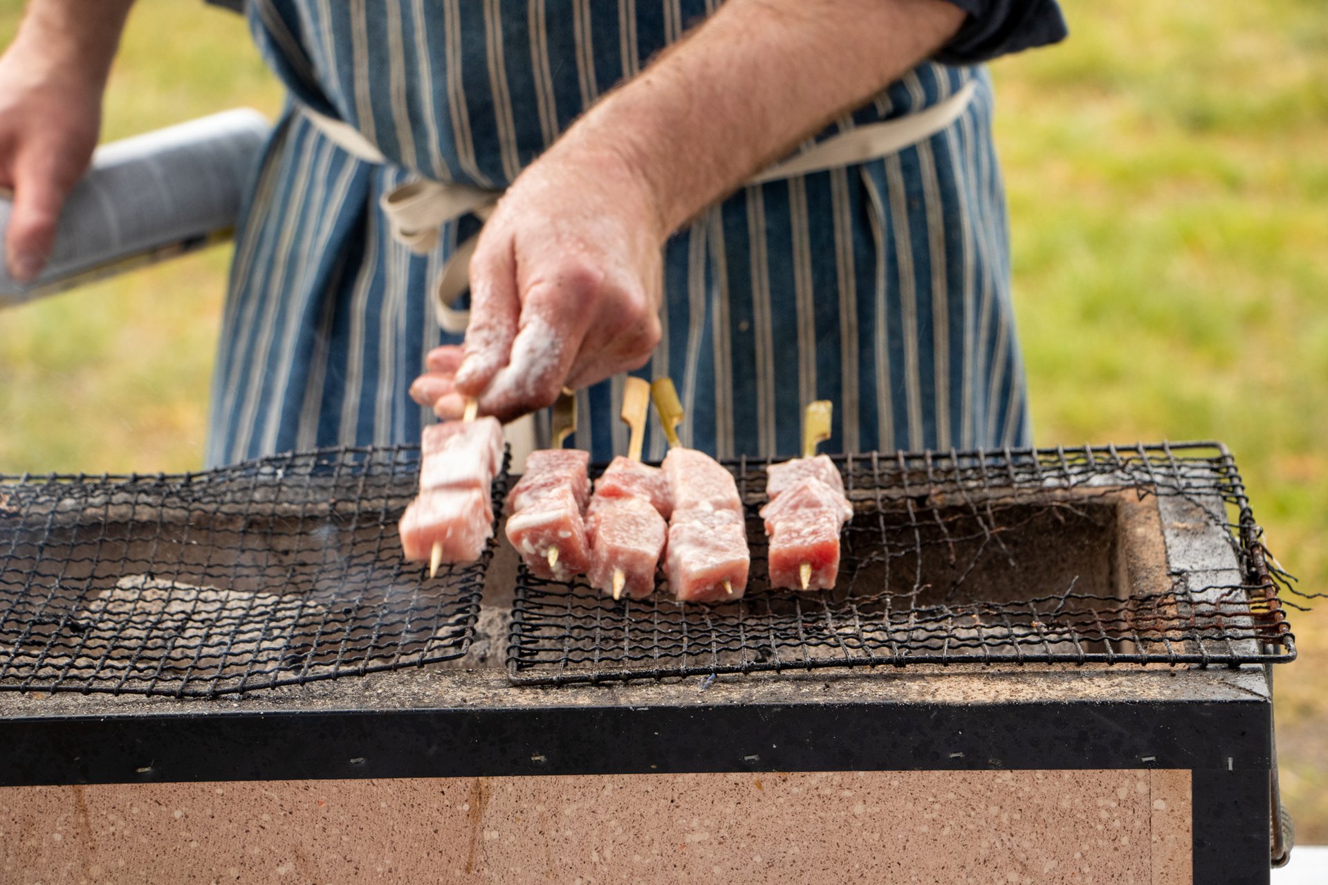Chefs from Big Tree Hospitality prepare bluefin kabobs for Tuna School.