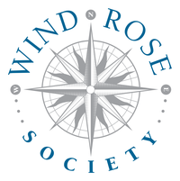 A logo for the Wind Rose giving society that contains a compass rose.